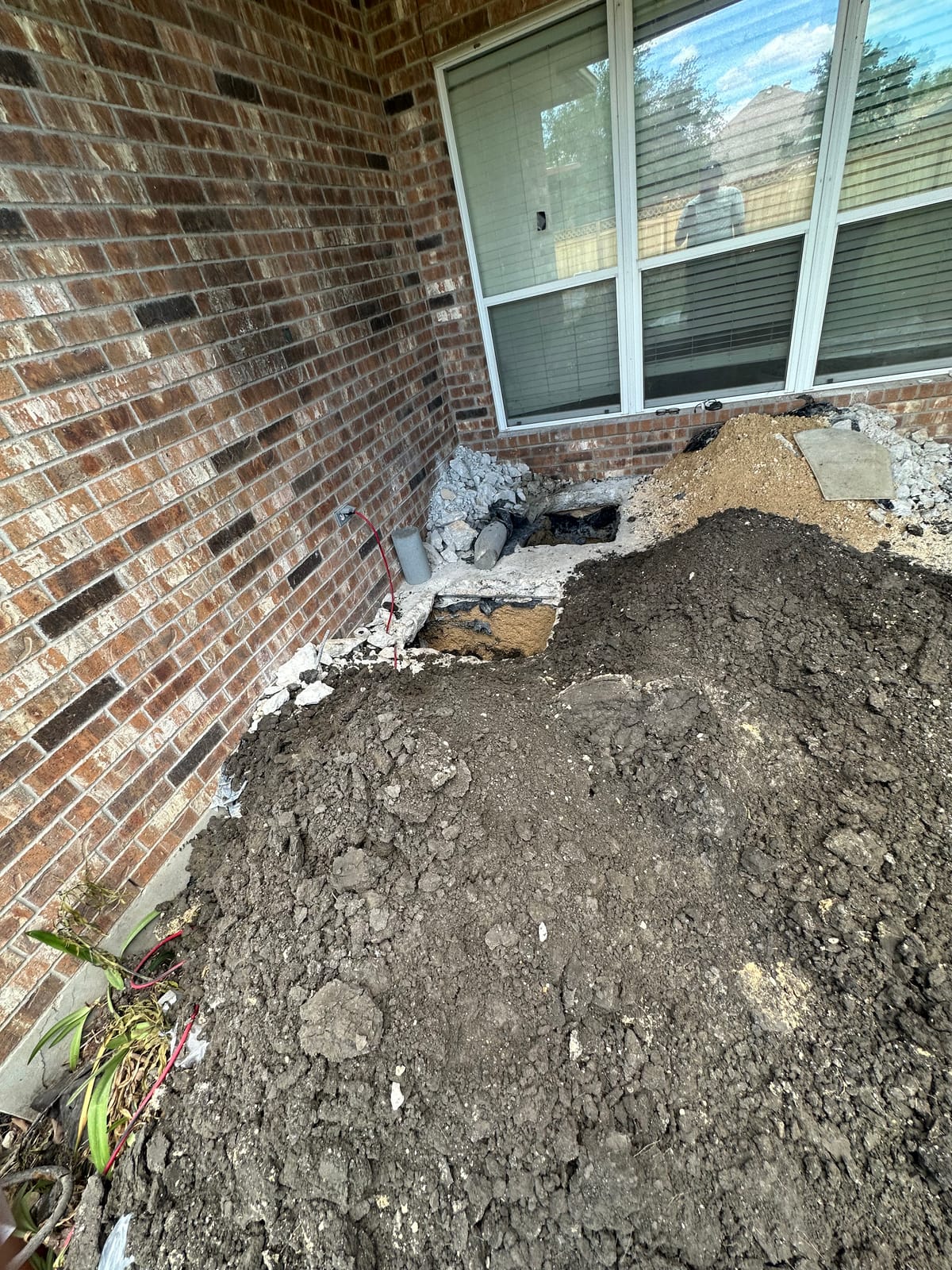 Foundation repair on a Central Texas home of the kind Motmot performs in New Braunfels, TX