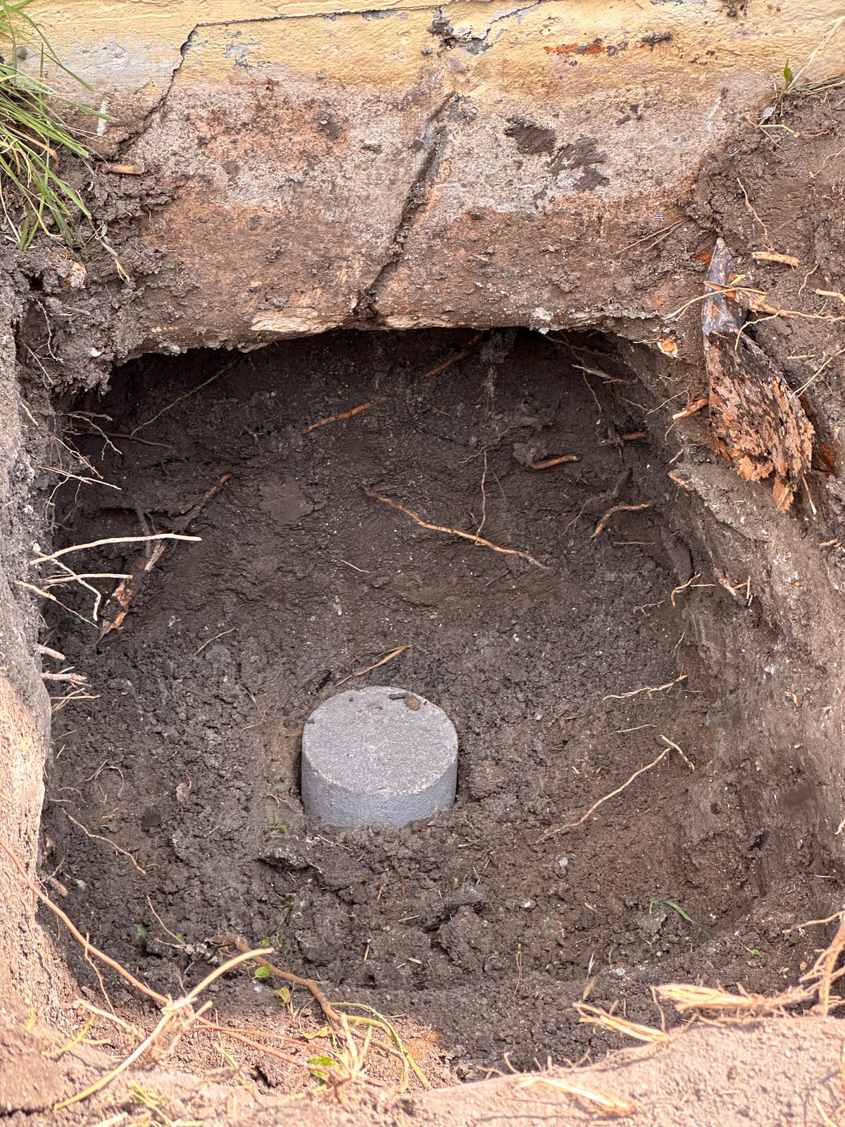 Engineer-led foundation pier installation on a Central Texas home near Bastrop, TX