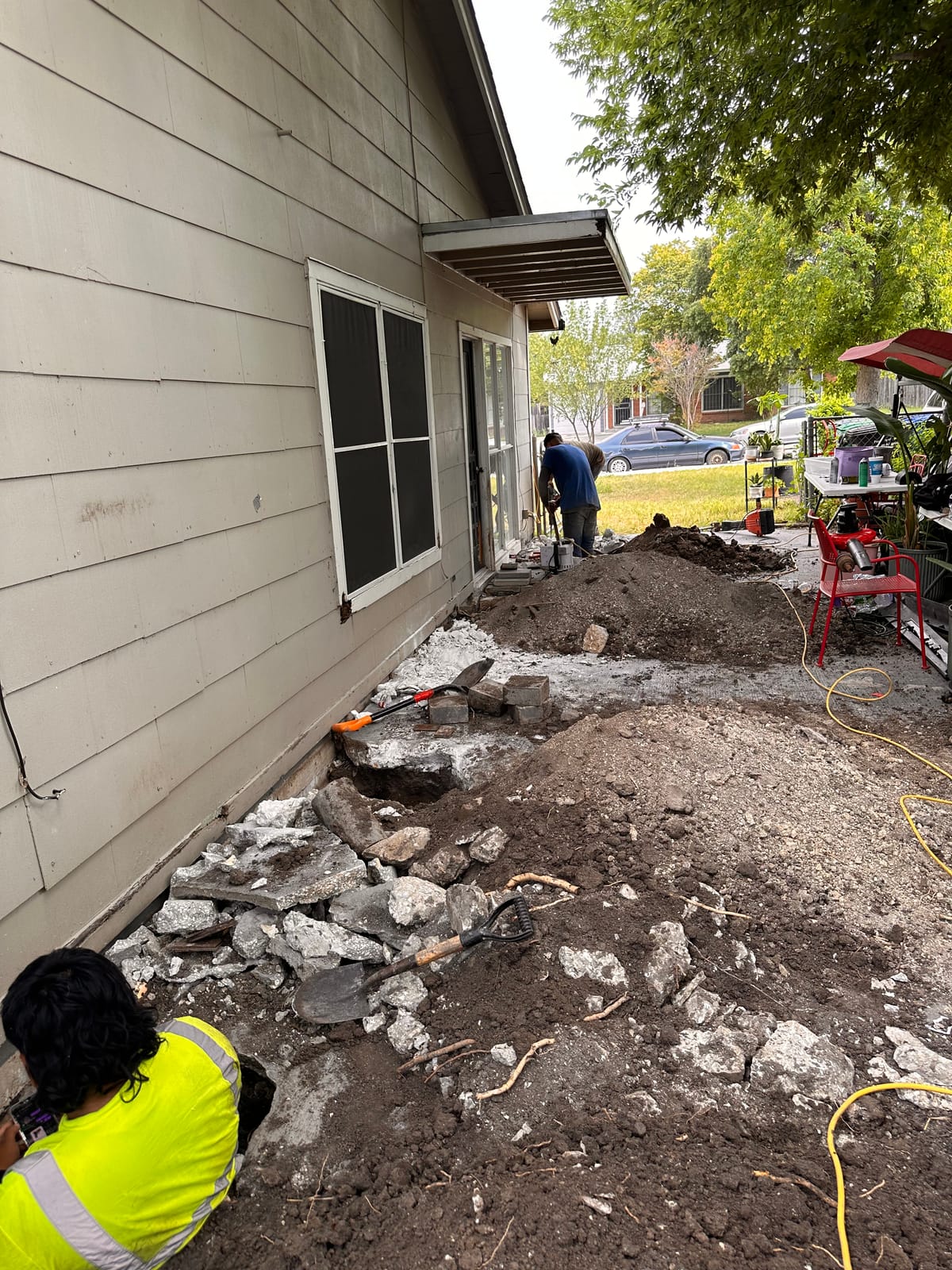 Engineer-led foundation pier installation on a Central Texas home near Bee Cave, TX