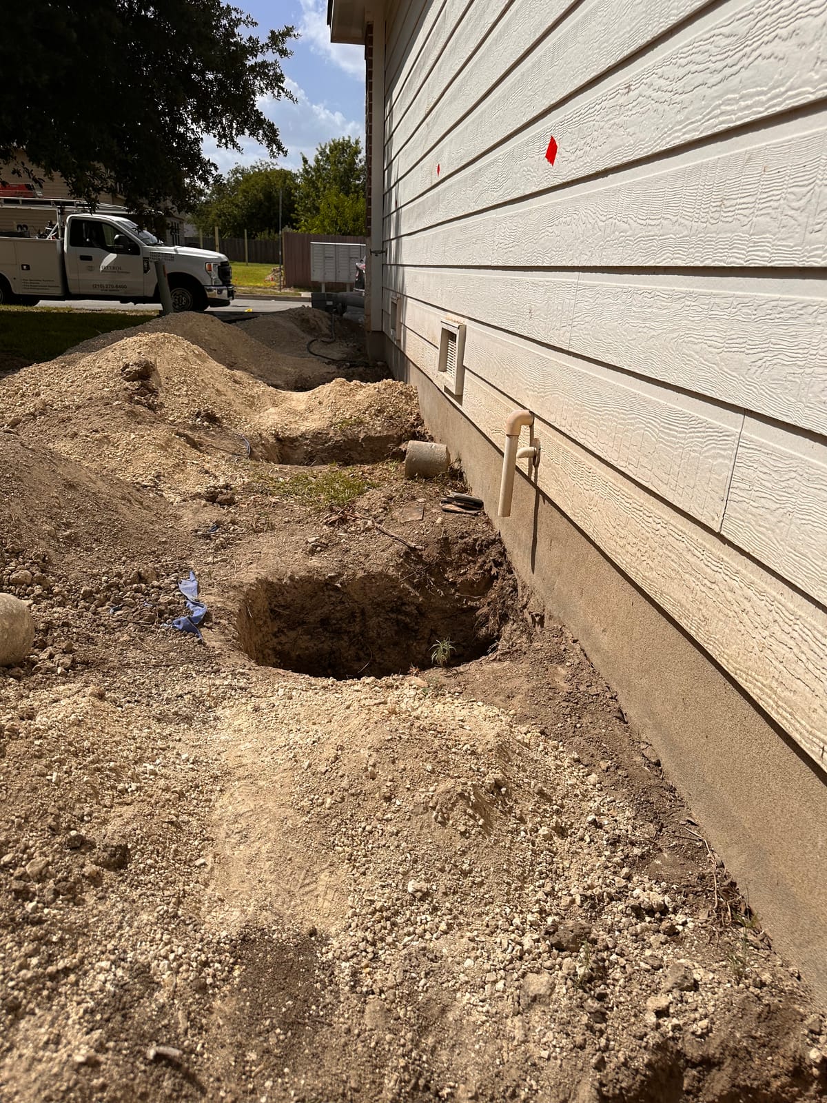 Engineer-led foundation pier installation on a Central Texas home near Cibolo, TX