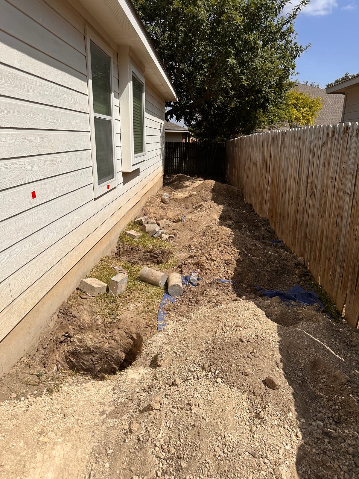 Engineer-led foundation pier installation on a Central Texas home near Georgetown, TX