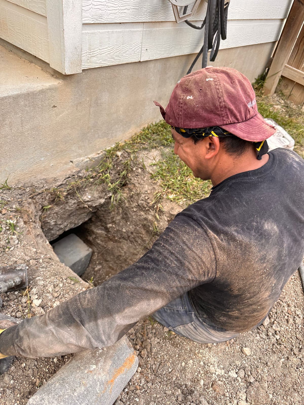 Engineer-led foundation pier installation on a Central Texas home near New Braunfels, TX