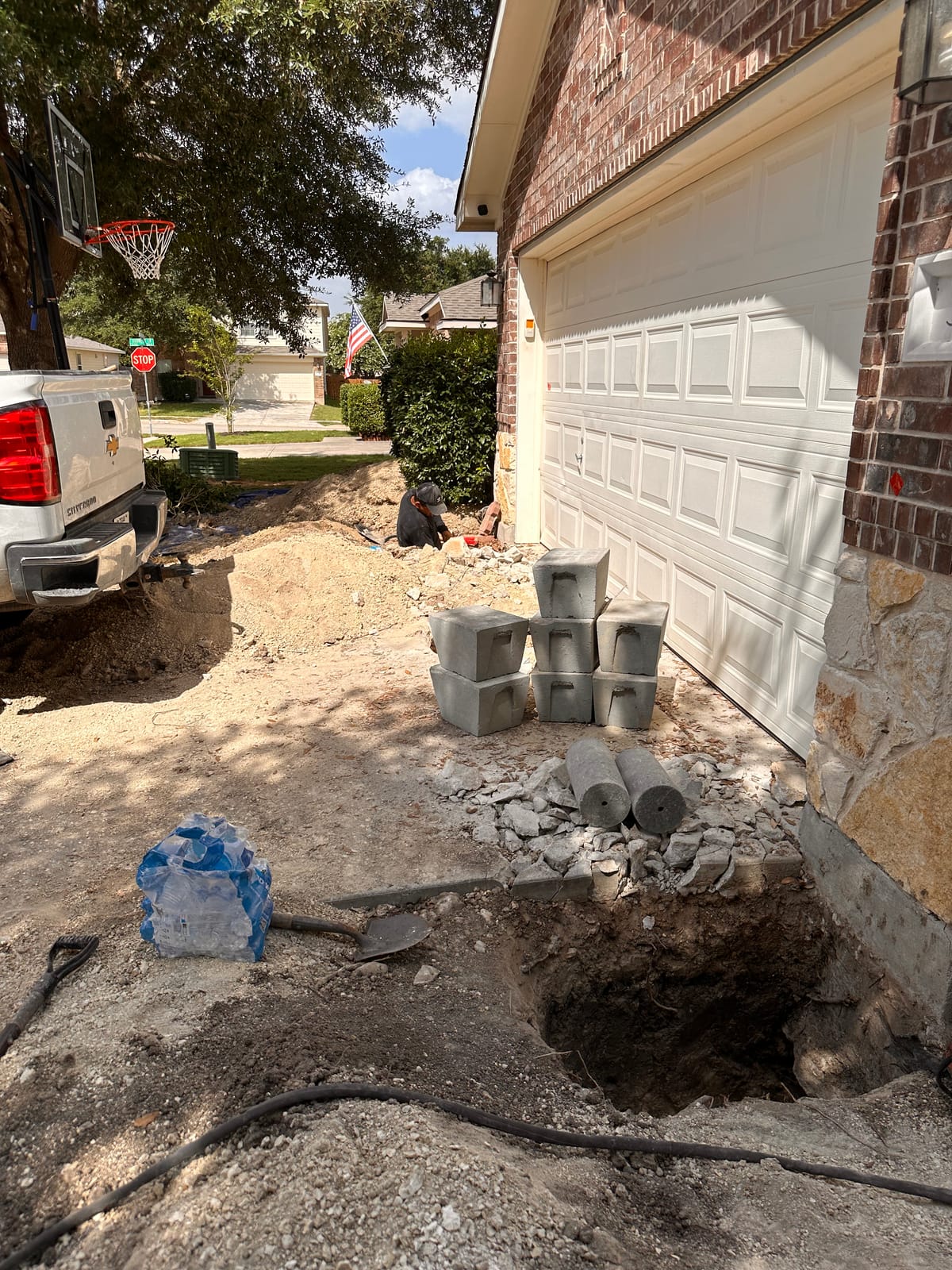 Engineer-led foundation pier installation on a Central Texas home near San Marcos, TX