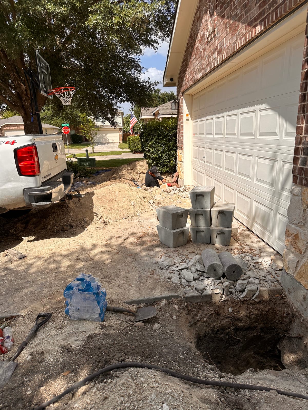 Engineer-led foundation pier installation on a Central Texas home near Schertz, TX